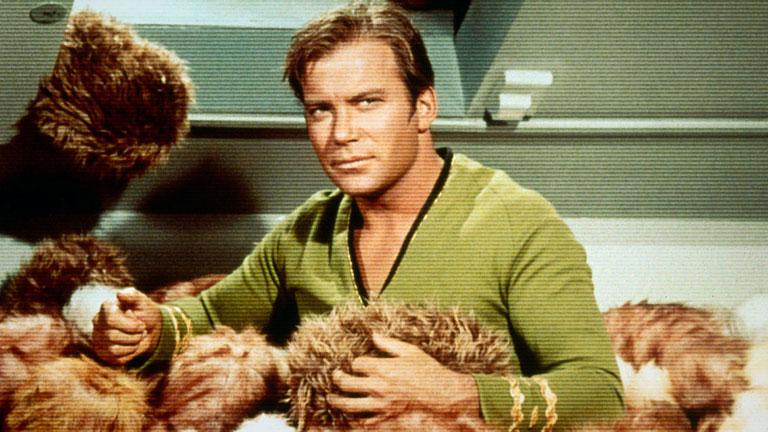 A scene from Star Trek: Captain Kirk deals with fuzzy tribbles